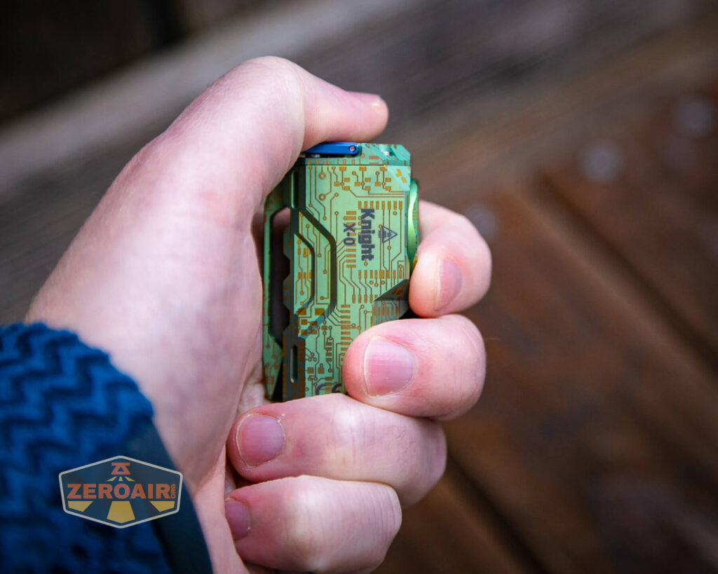 Wuben X-0 Knight titanium flashlight in hand