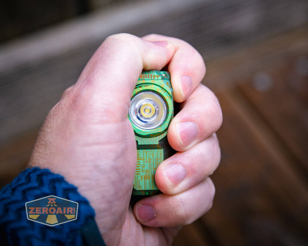 Wuben X-0 Knight titanium flashlight in hand