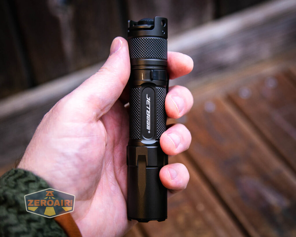 JETBeam TH10R Tactical flashlight in hand