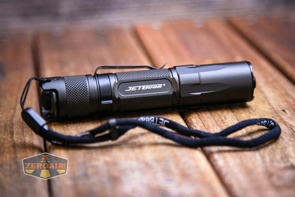 JETBeam TH10R Tactical flashlight lanyard installed