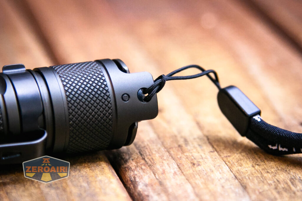 JETBeam TH10R Tactical flashlight lanyard installed