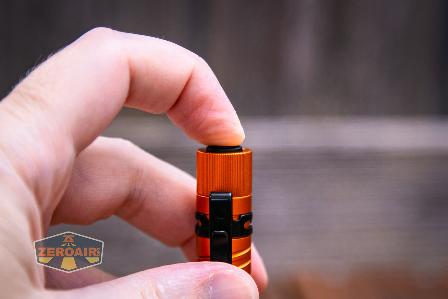 Olight i3T EOS flashlight tailswitch actuation