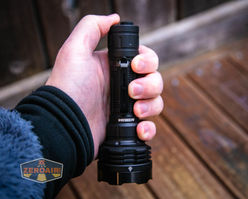 Acebeam Defender P18 tactical flashlight in hand