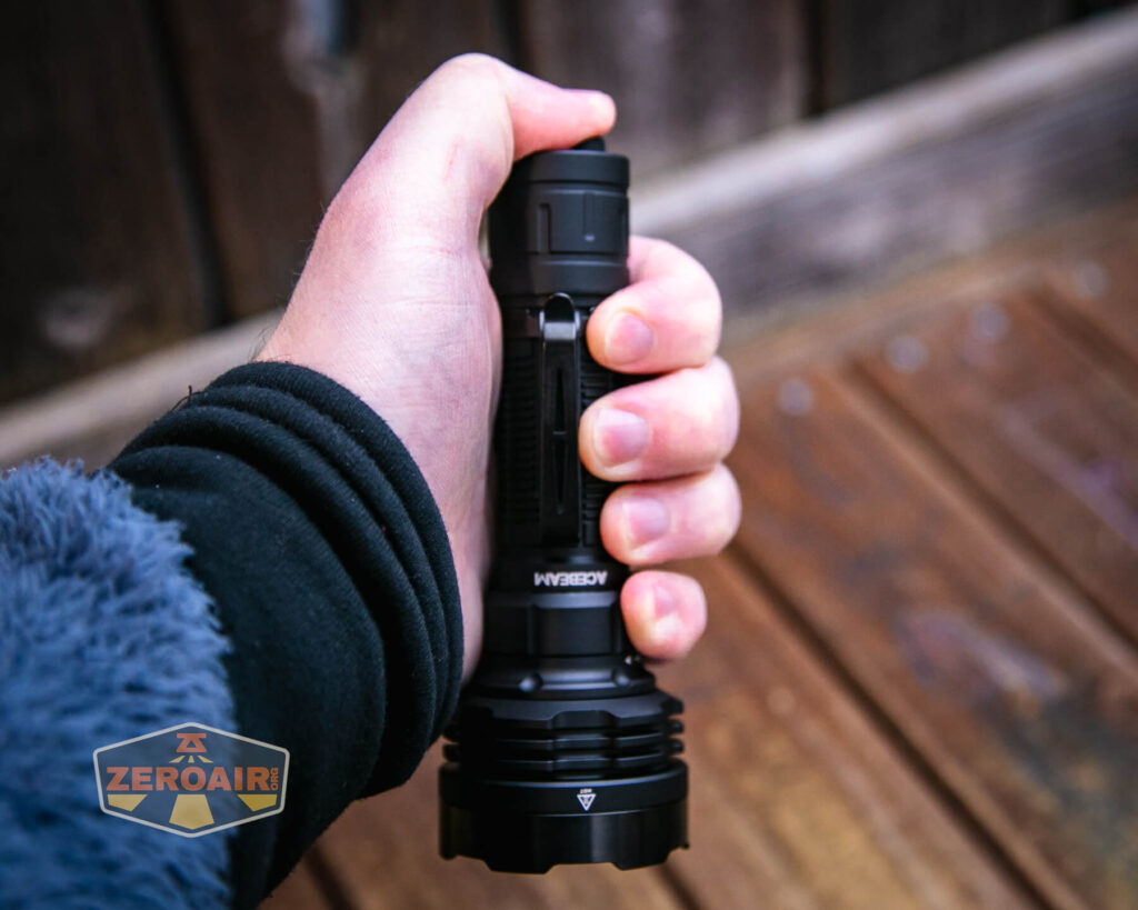 Acebeam Defender P18 tactical flashlight in hand