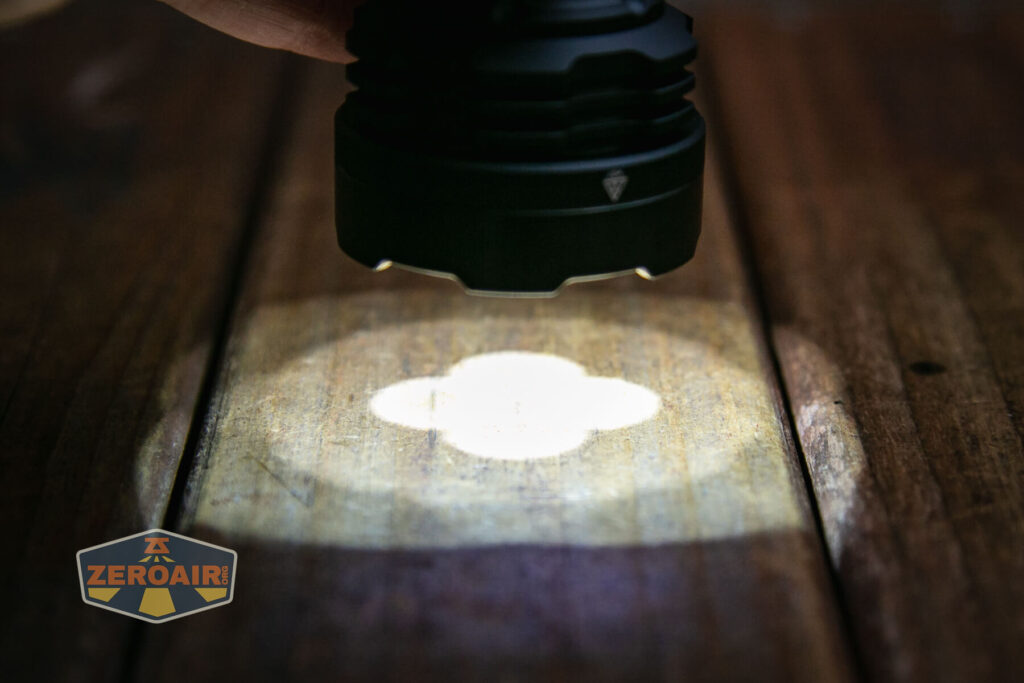 Acebeam Defender P18 tactical flashlight beam close view