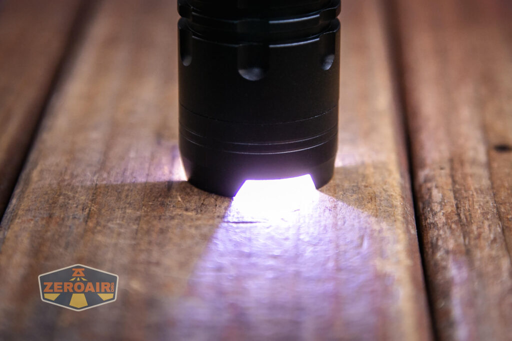 Observer FL1000 Zoomie flashlight strike bezel