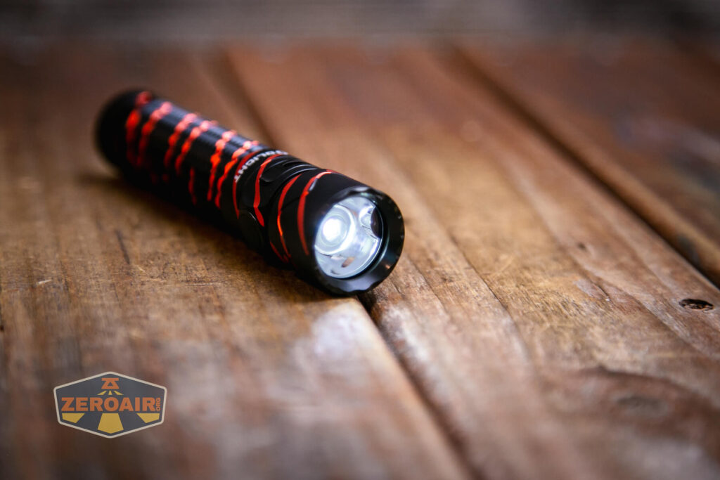 Olight Warrior Mini 2 Black Lava flashlight emitter on