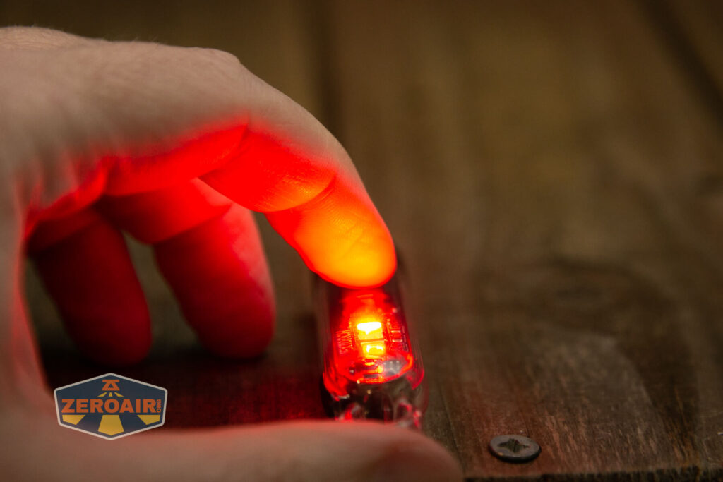 Nextorch K40 keychain flashlight side emitters on