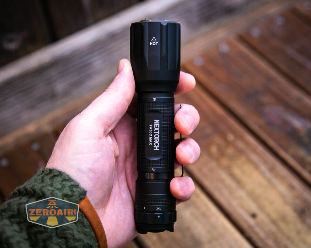 Nextorch TA30C Max One-step Strobe Tactical flashlight in hand