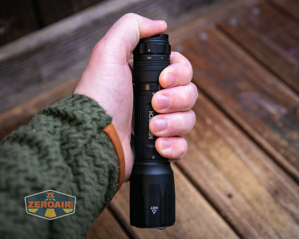 Nextorch TA30C Max One-step Strobe Tactical flashlight in hand
