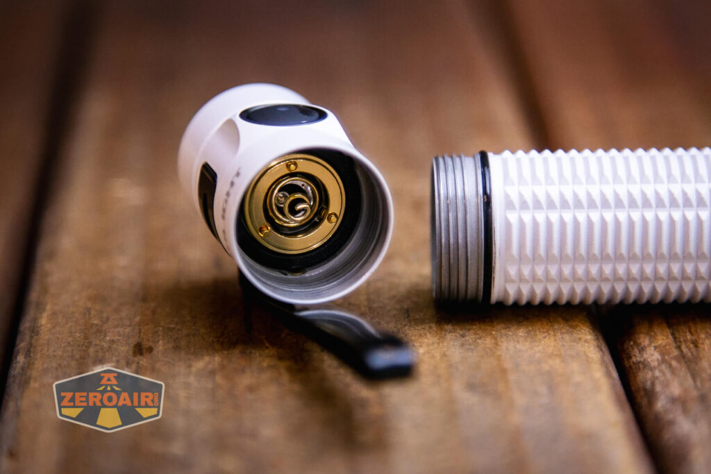 Olight Baton 3 Pro rechargeable flashlight contacts in head