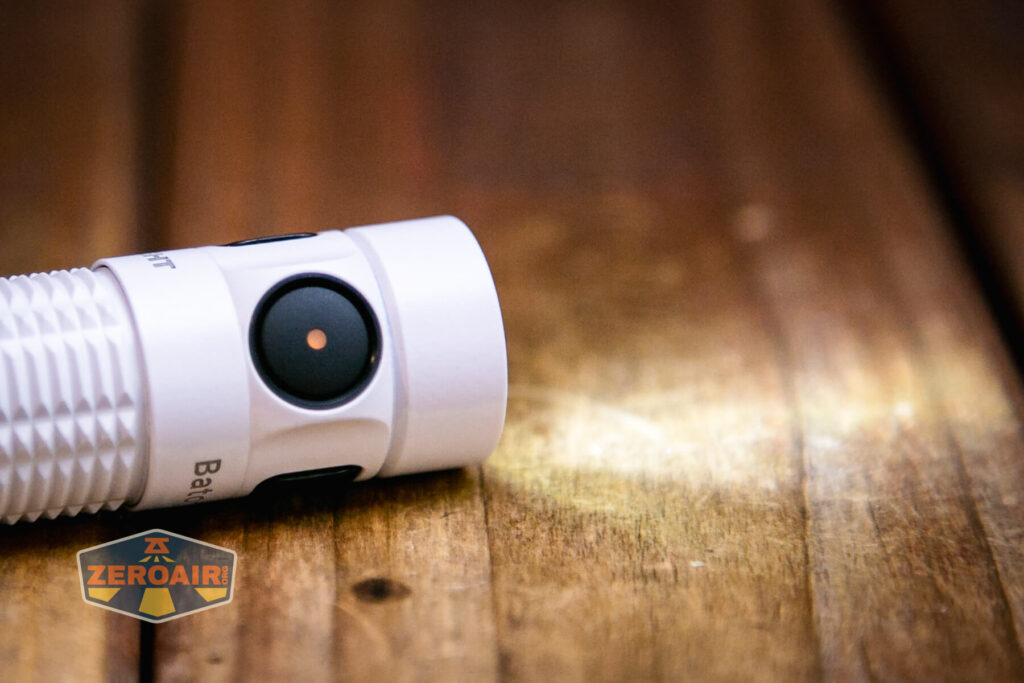 Olight Baton 3 Pro rechargeable flashlight e-switch indicating orange