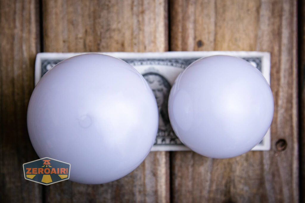 Olight Obulb Pro S lantern on two dollar bill