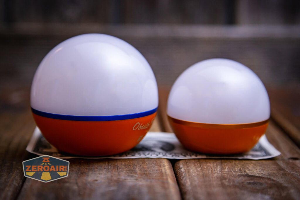 Olight Obulb Pro S lantern on two dollar bill