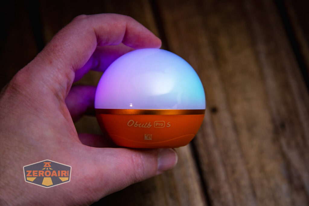 Olight Obulb Pro S lantern on in hand