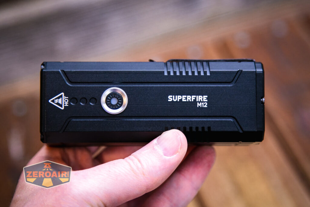Superfire M12 Rechargeable flashlight in hand