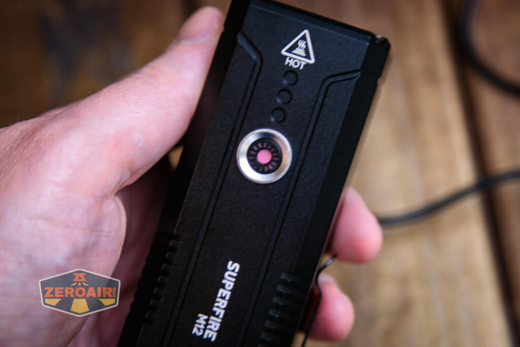 Superfire M12 Rechargeable flashlight e-switch detail