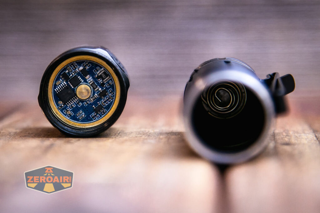 Thrunite T2 rechargeable flashlight spring and button 