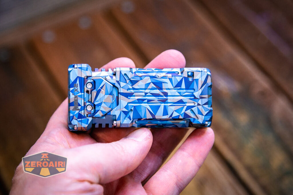 Wuben X-2 Owl Titanium flashlight in hand