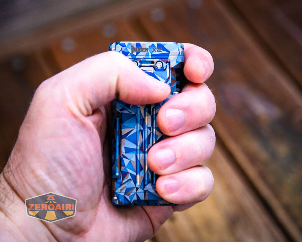 Wuben X-2 Owl Titanium flashlight in hand