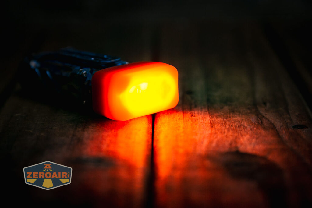 Wuben X-2 Owl Titanium flashlight lens cover in use