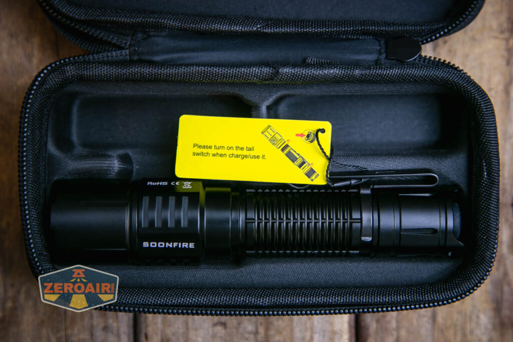 Soonfire MX75 flashlight inside softshell case