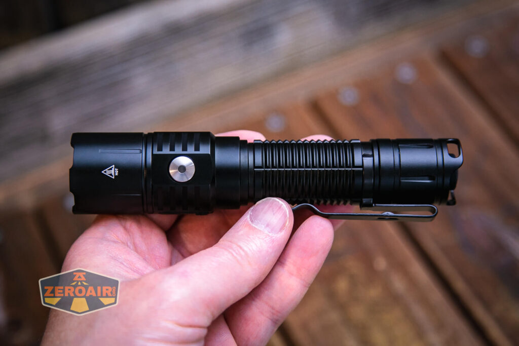 Soonfire MX75 flashlight in hand