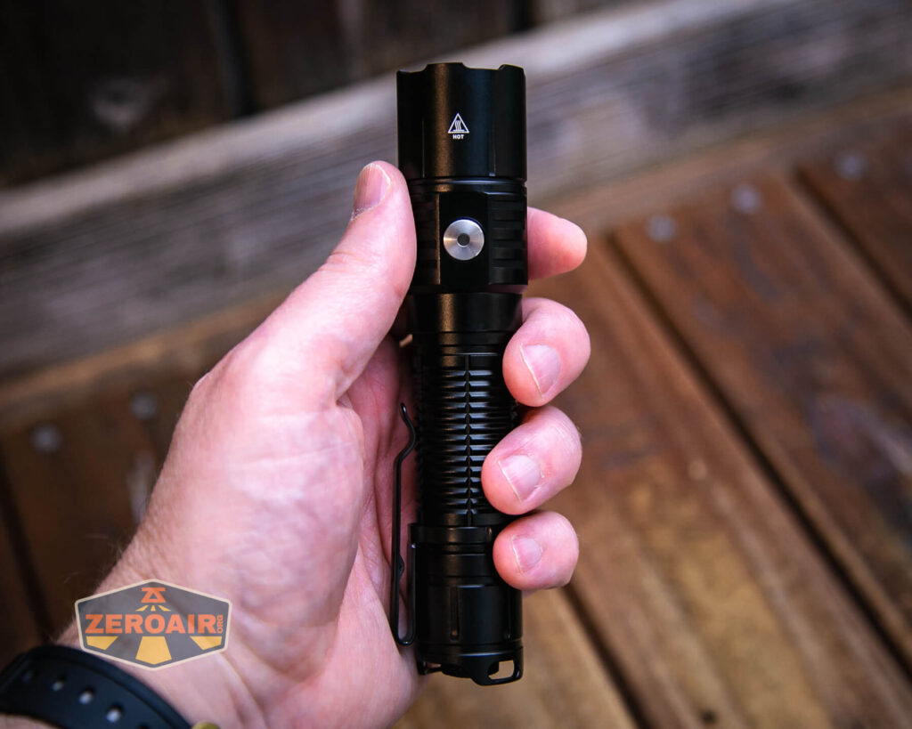 Soonfire MX75 flashlight in hand