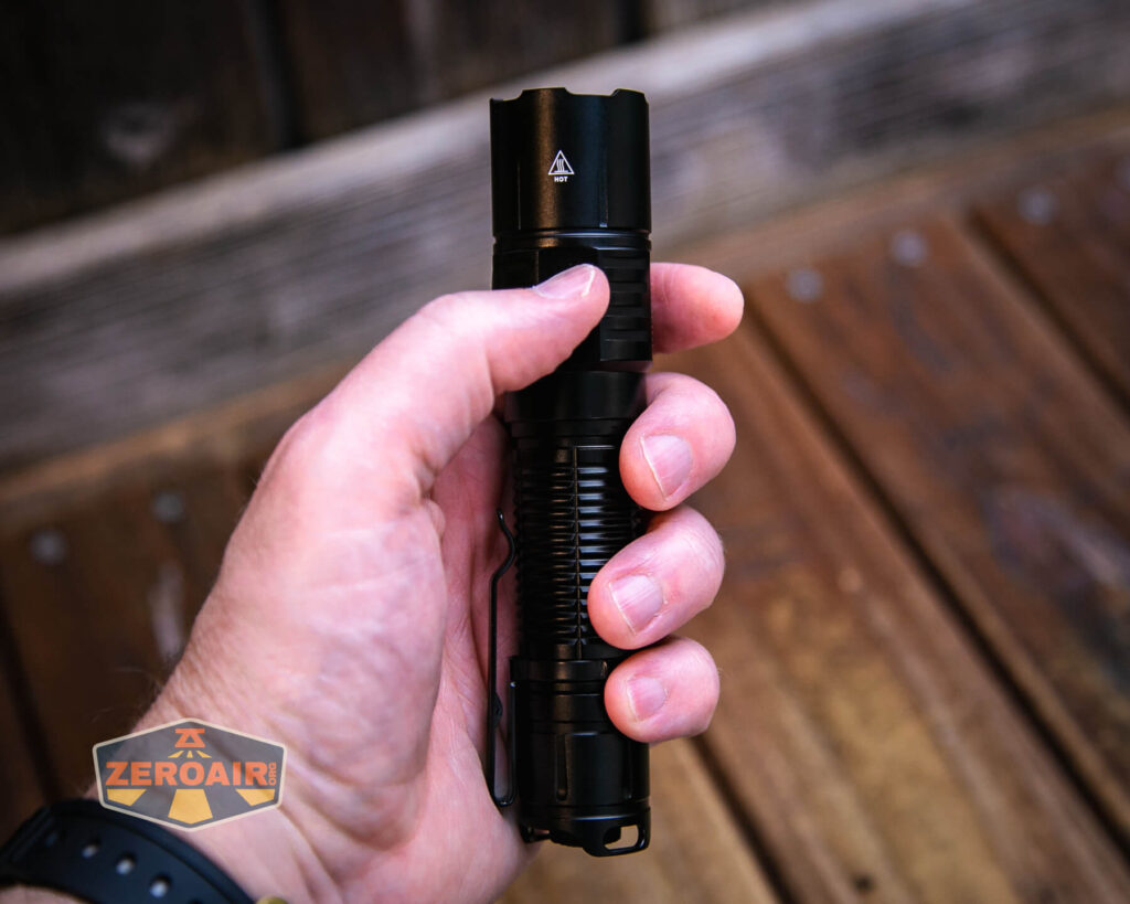 Soonfire MX75 flashlight in hand