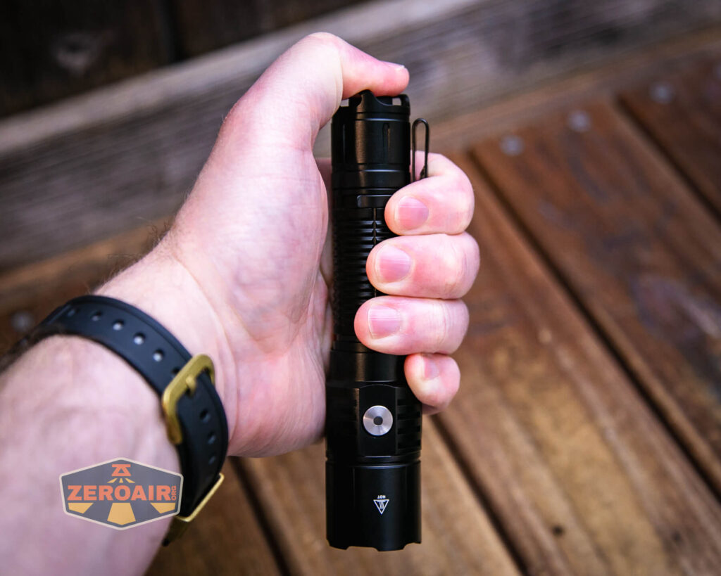 Soonfire MX75 flashlight in hand