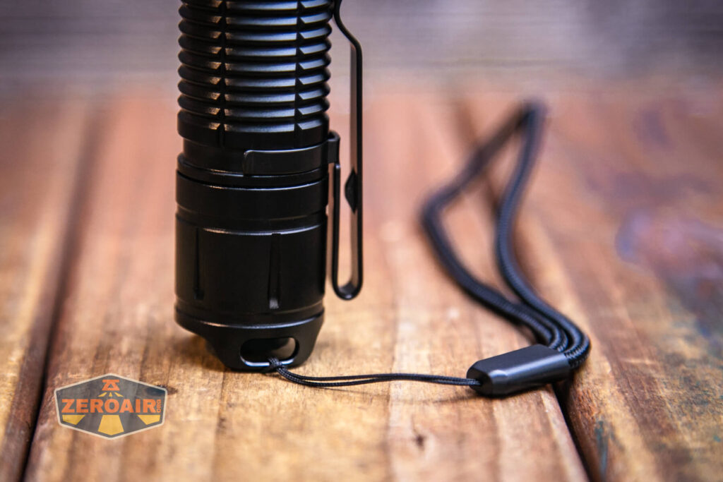 Soonfire MX75 flashlight lanyard installed