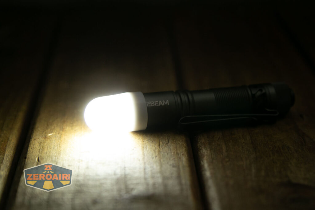 Acebeam Pokelit AA Gray flashlight emitter on with white diffuser