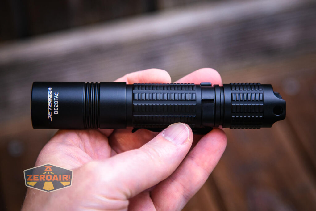JETBeam BC20 TAC tactical flashlight in hand