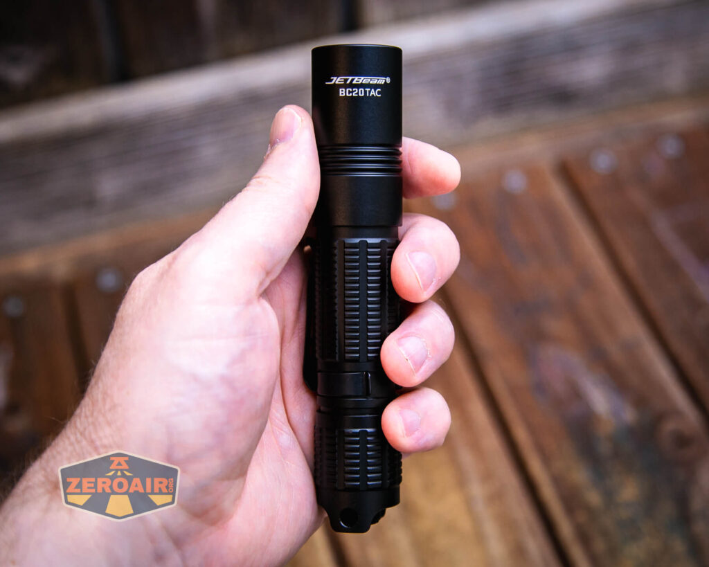 JETBeam BC20 TAC tactical flashlight in hand