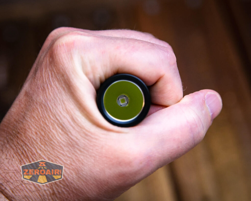 JETBeam BC20 TAC tactical flashlight in hand