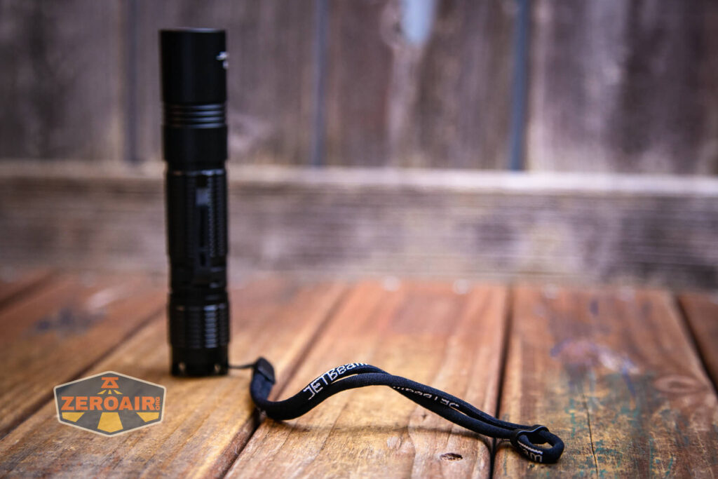 JETBeam BC20 TAC tactical flashlight lanyard installed