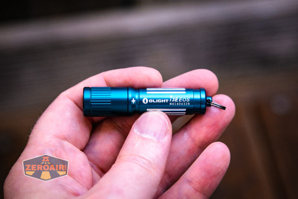 Olight i3E EOS AAA flashlight in hand