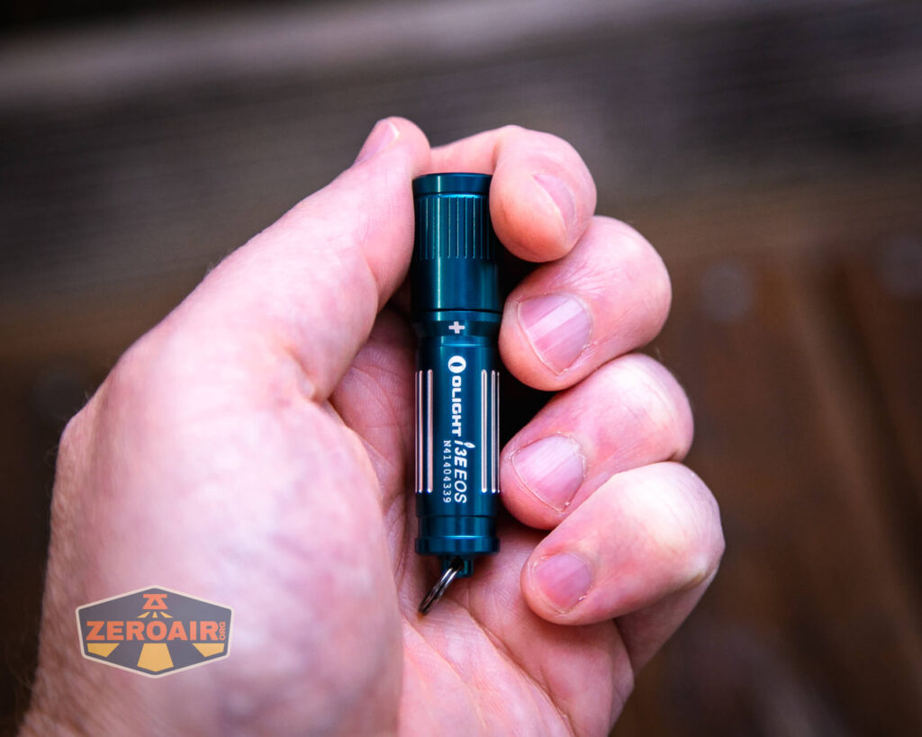 Olight i3E EOS AAA flashlight in hand