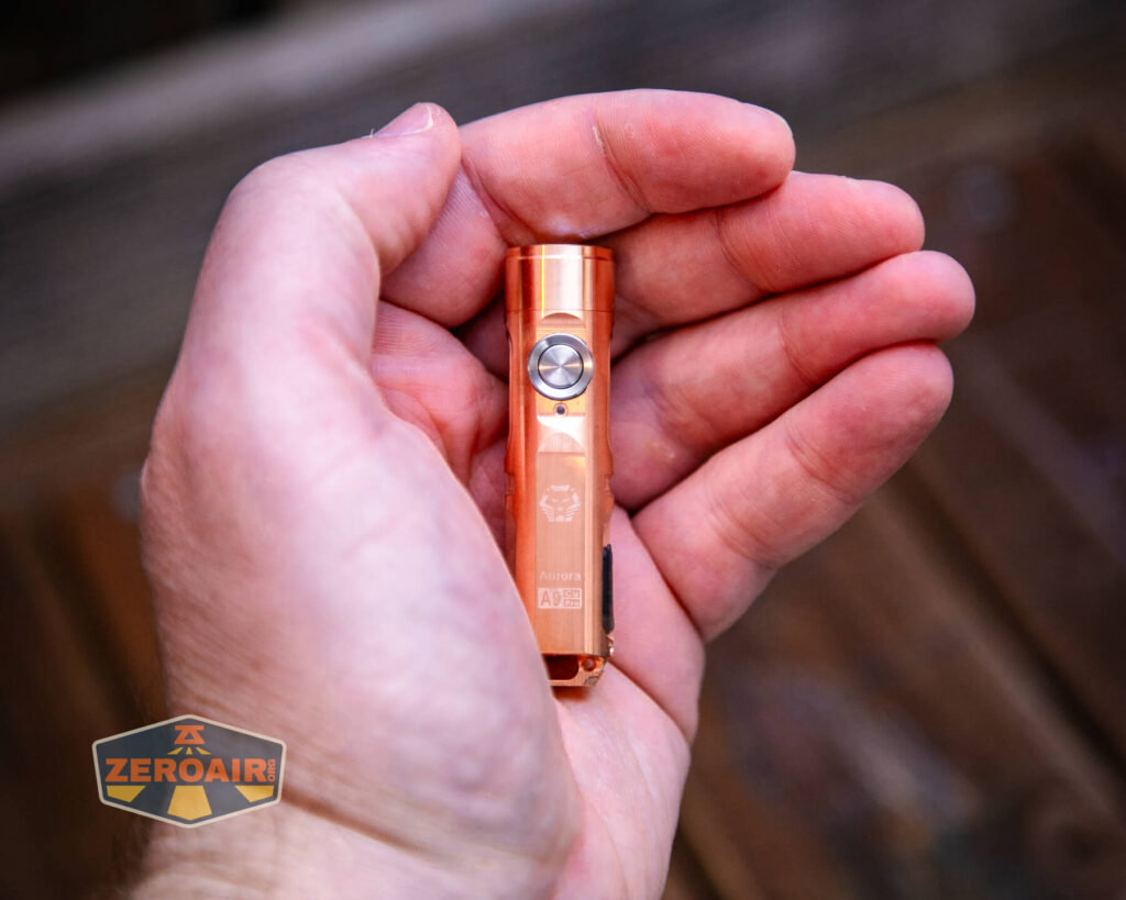 RovyVon Aurora A9 Pro Copper flashlight in hand