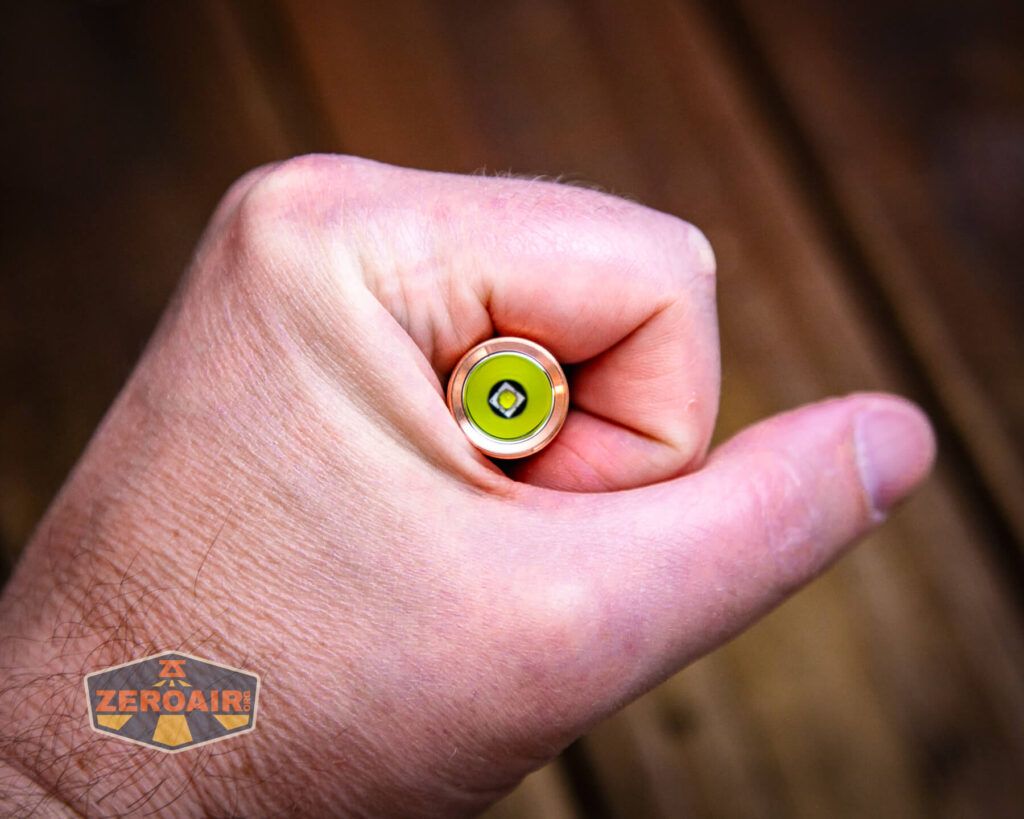 RovyVon Aurora A9 Pro Copper flashlight in hand