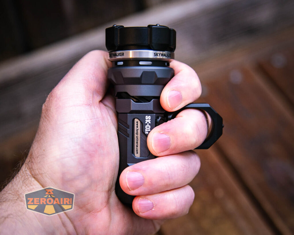 Loop SK-01s LED flashlight in hand