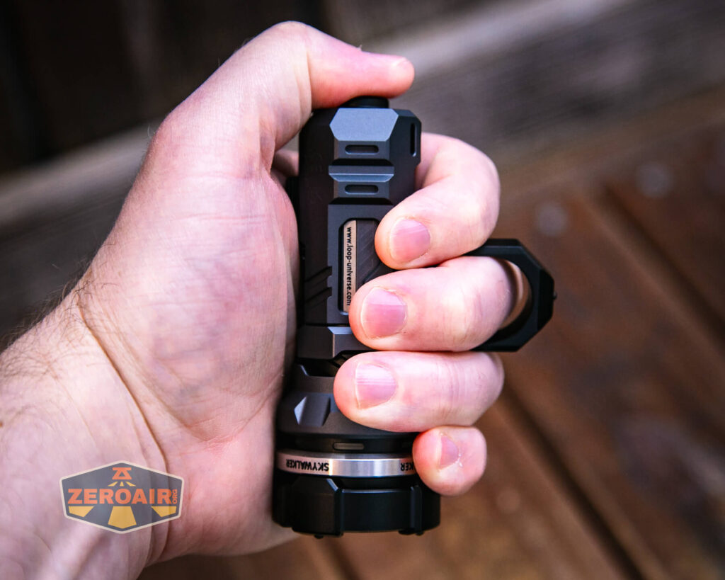 Loop SK-01s LED flashlight in hand