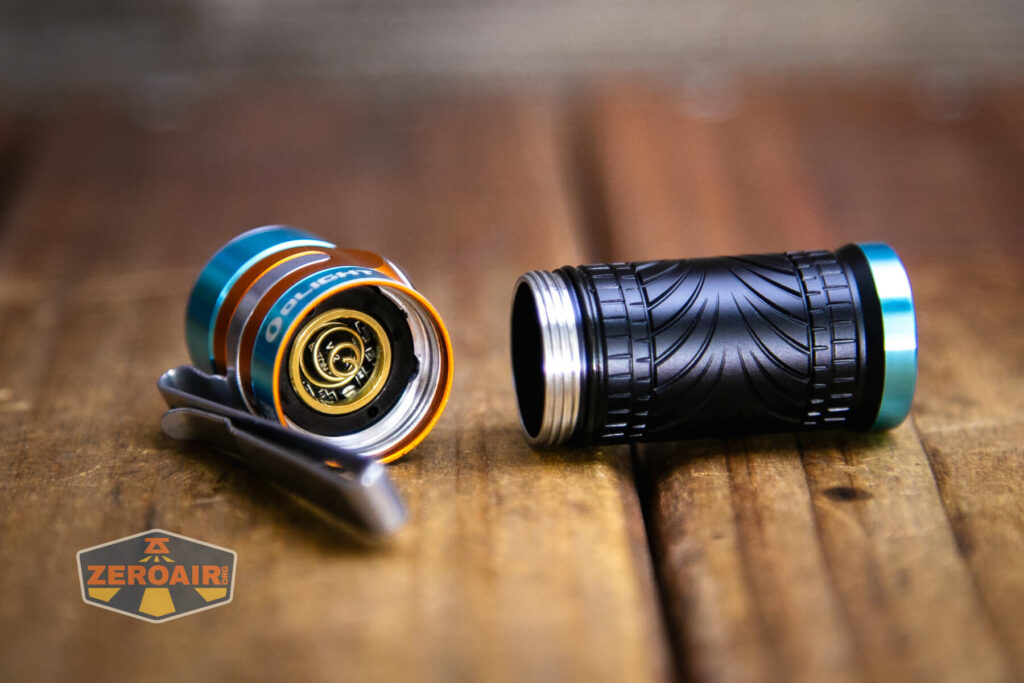 Olight Baton 3 Roadster head off showing threads and springs