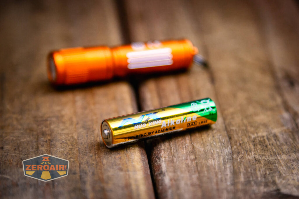 Olight i3E EOS Orange flashlight with included aaa cell