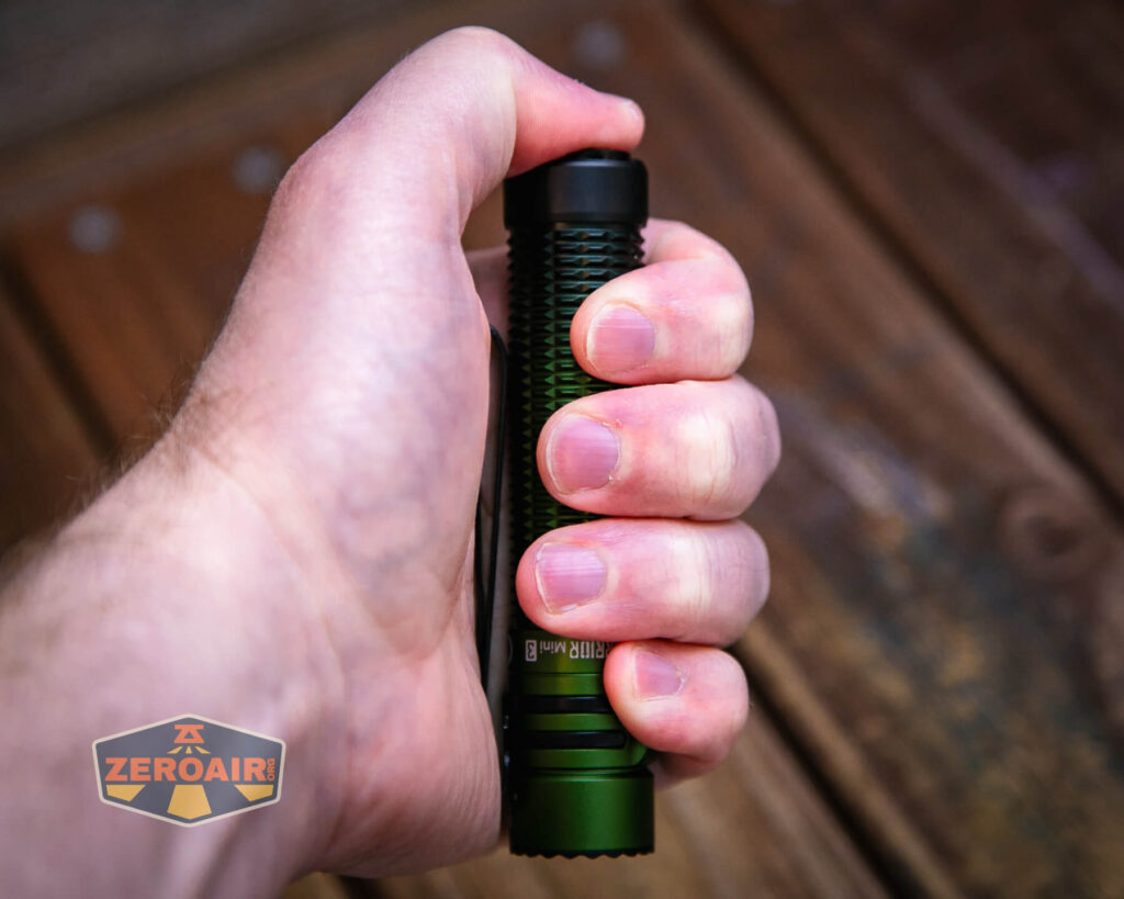 Olight Warrior Mini 3 flashlight in hand