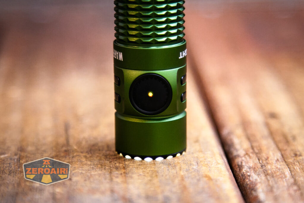 Olight Warrior Mini 3 flashlight emitter on while headstanding