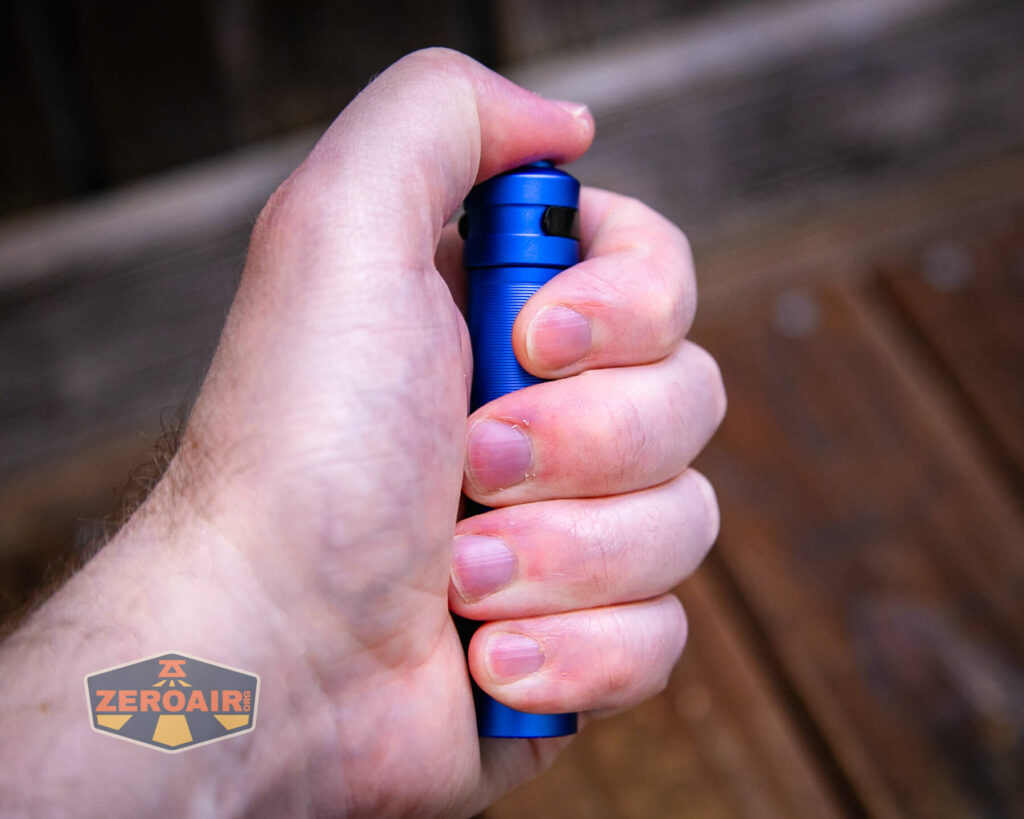Thrunite Archer Pro V2 blue flashlight in hand