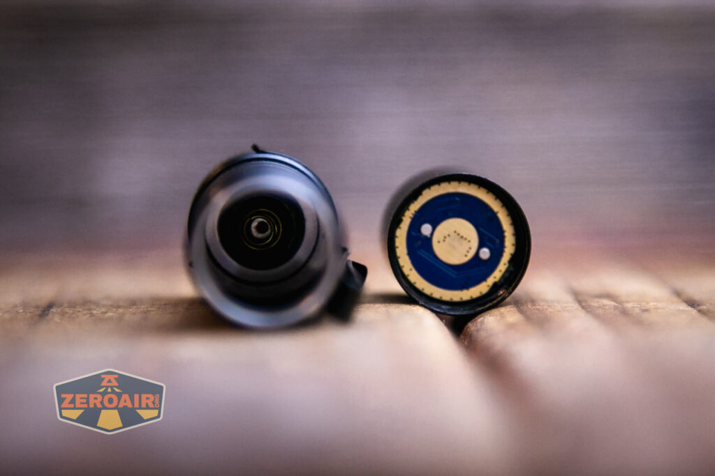 Thrunite Saber EDC pocket flashlight showing spring in tail