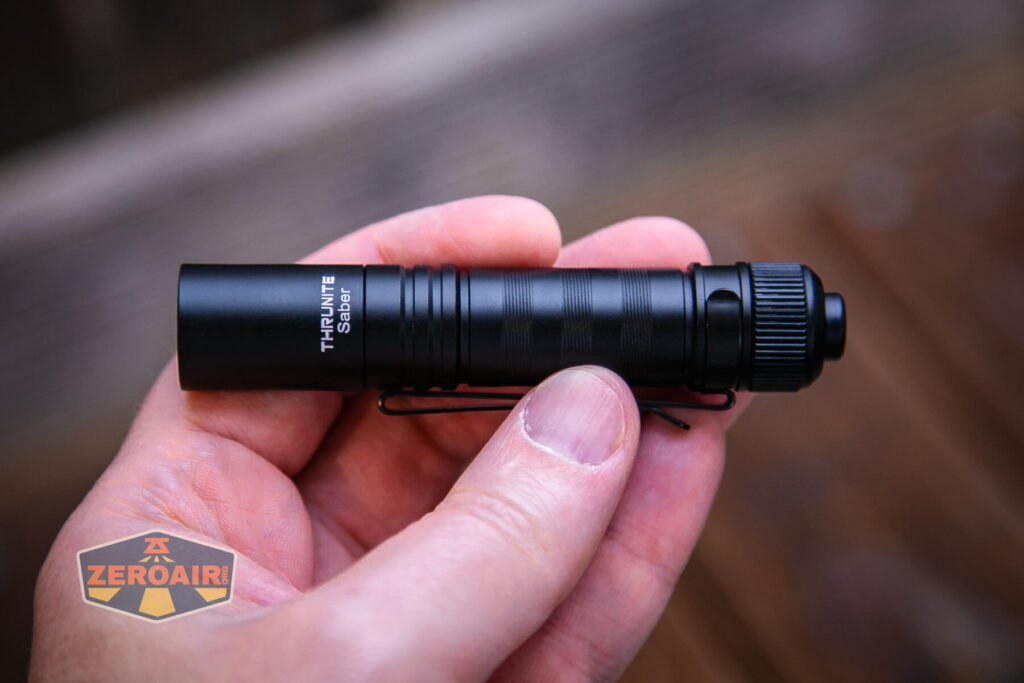Thrunite Saber EDC pocket flashlight in hand