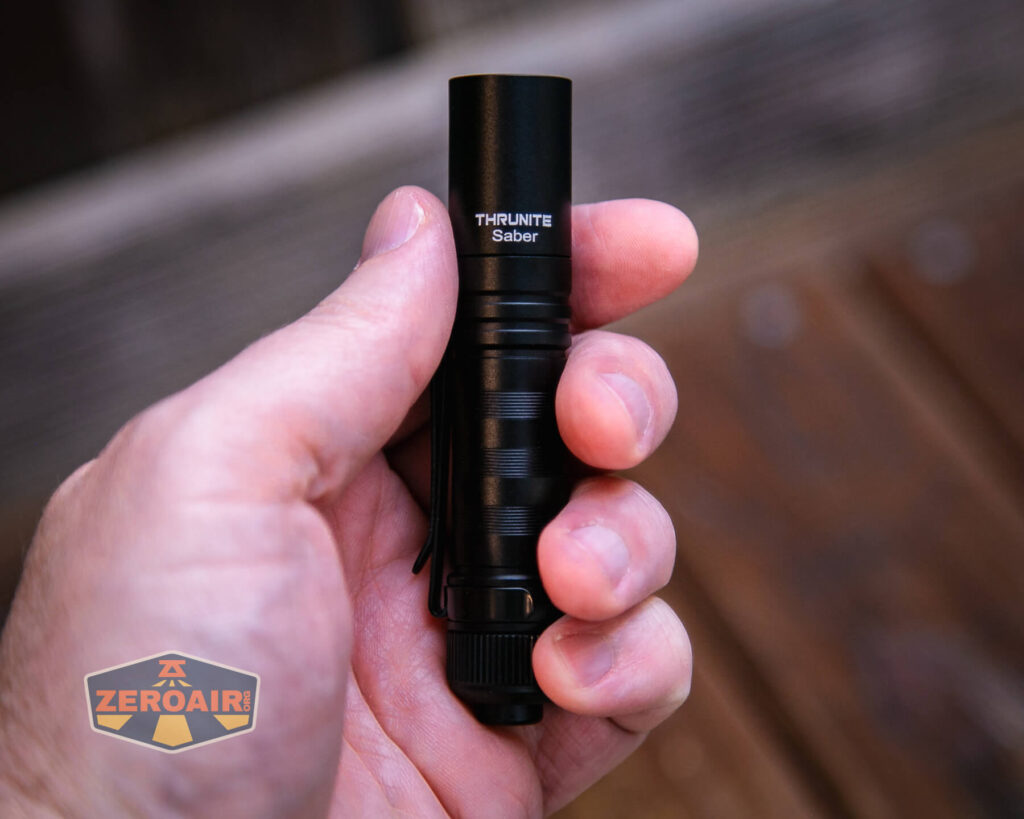 Thrunite Saber EDC pocket flashlight in hand